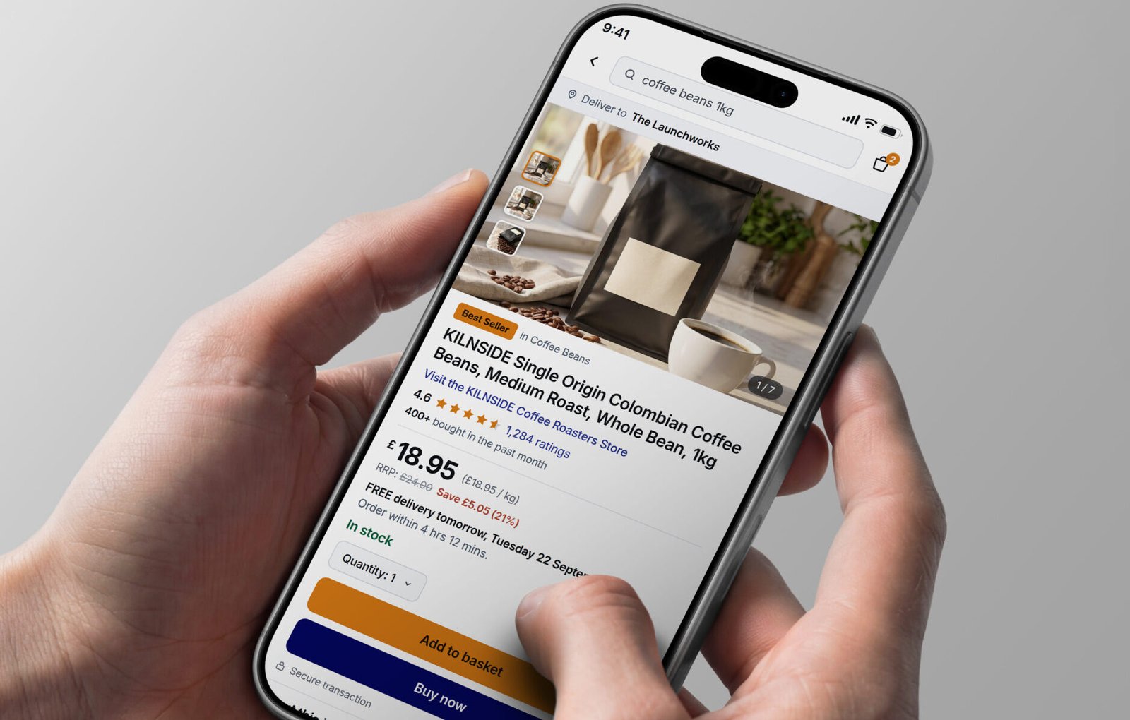 Hands holding a phone showing a coffee product listing on Amazon